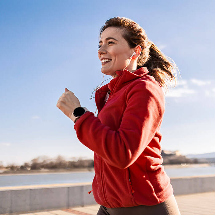 woman on a run near waterfront