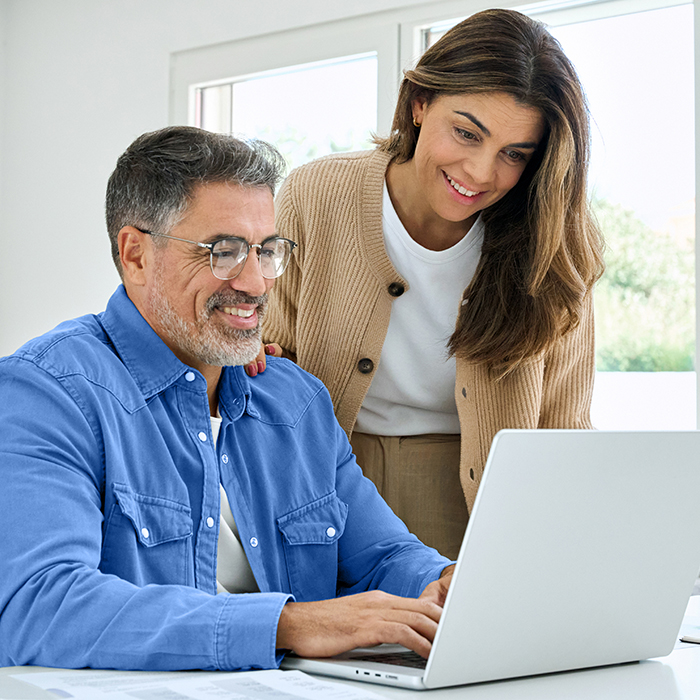 Couple signing up for CardioNow Athena Patient Portal
