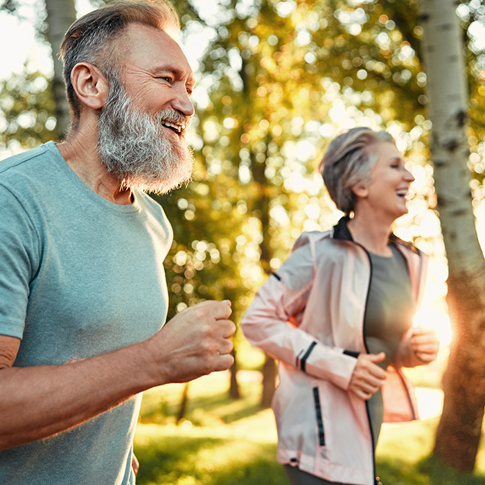 senior couple jogging for cardiovascular health