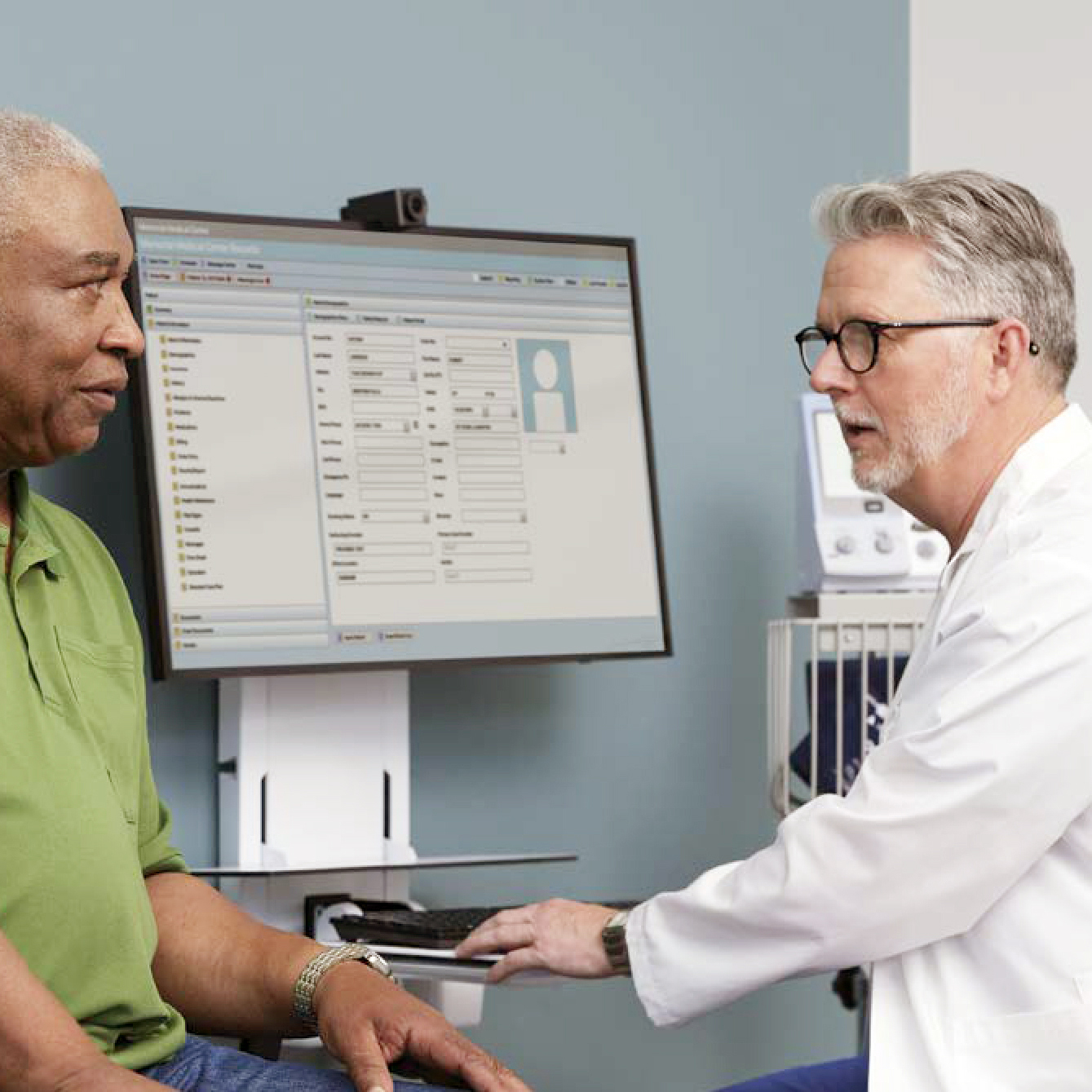 african american patient with cardiologist