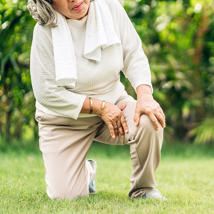 senior woman in leg pain
