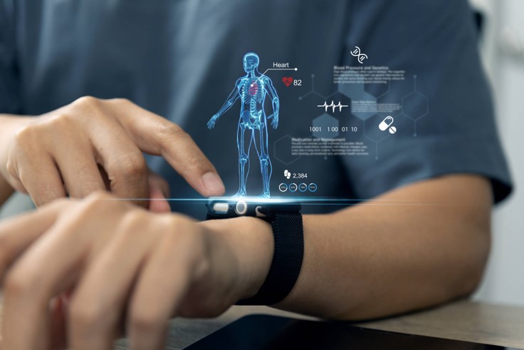 Person using smartwatch with hologram heart health dashboard and real‑time cardiovascular monitoring